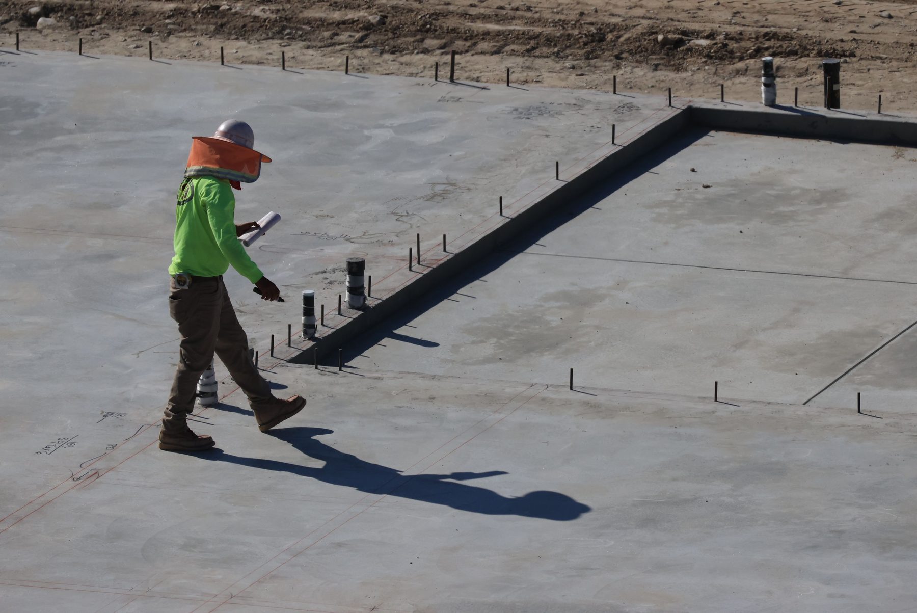 Representative site engineer inspecting construction work
